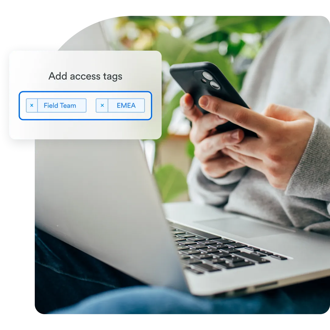 Background shows closet up of user on their phone with a laptop in their lap, then an Add Access Tags window shows to further flexible authentication options within the Duo app.
