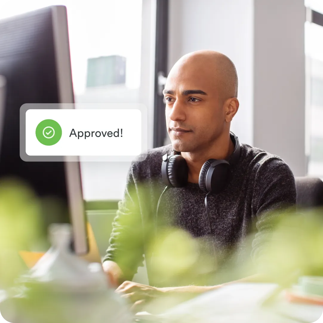 Working professional seeing MFA approval on their desktop computer screen from Duo Passport.