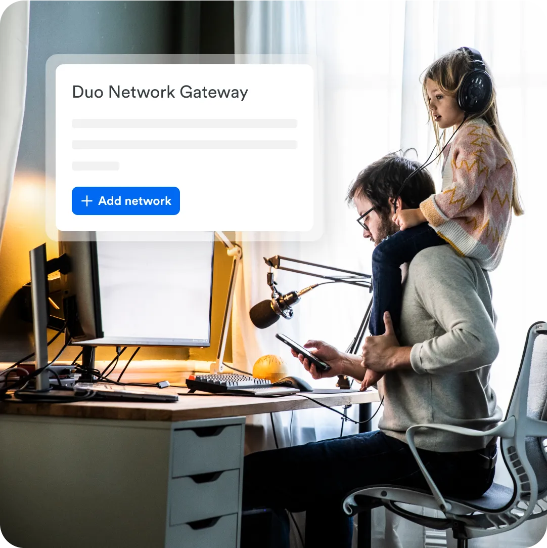 Father and daughter are at a home computer securely connecting to a work network via Duo Network Gateway for seamless, protected access.