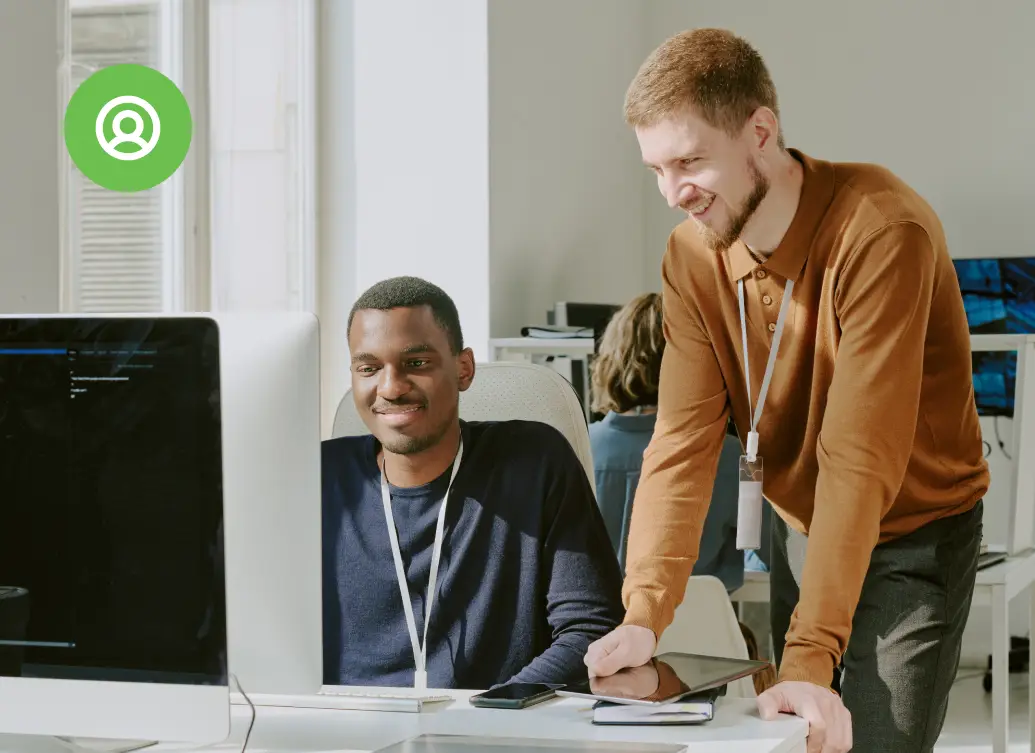 Pop-up notification 367 Authentications graphic in the corner of a photo of 2 male colleagues working together and collaborating